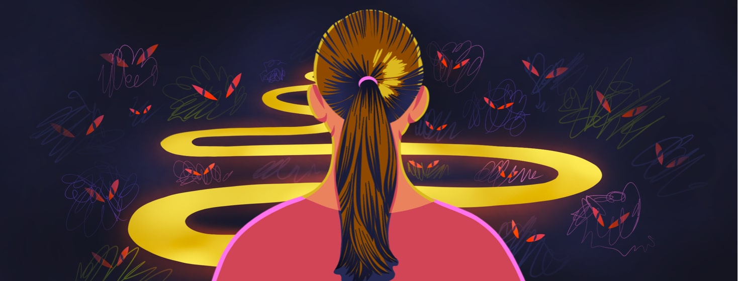 A woman looks ahead at a glowing path that cuts through a dark scary space
